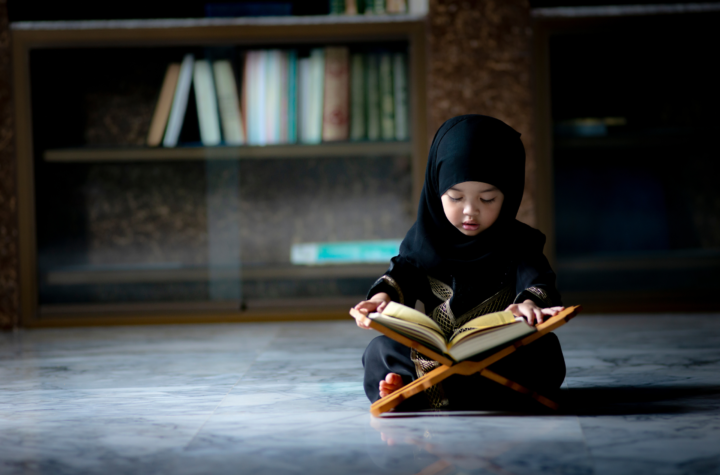 kid with Quran