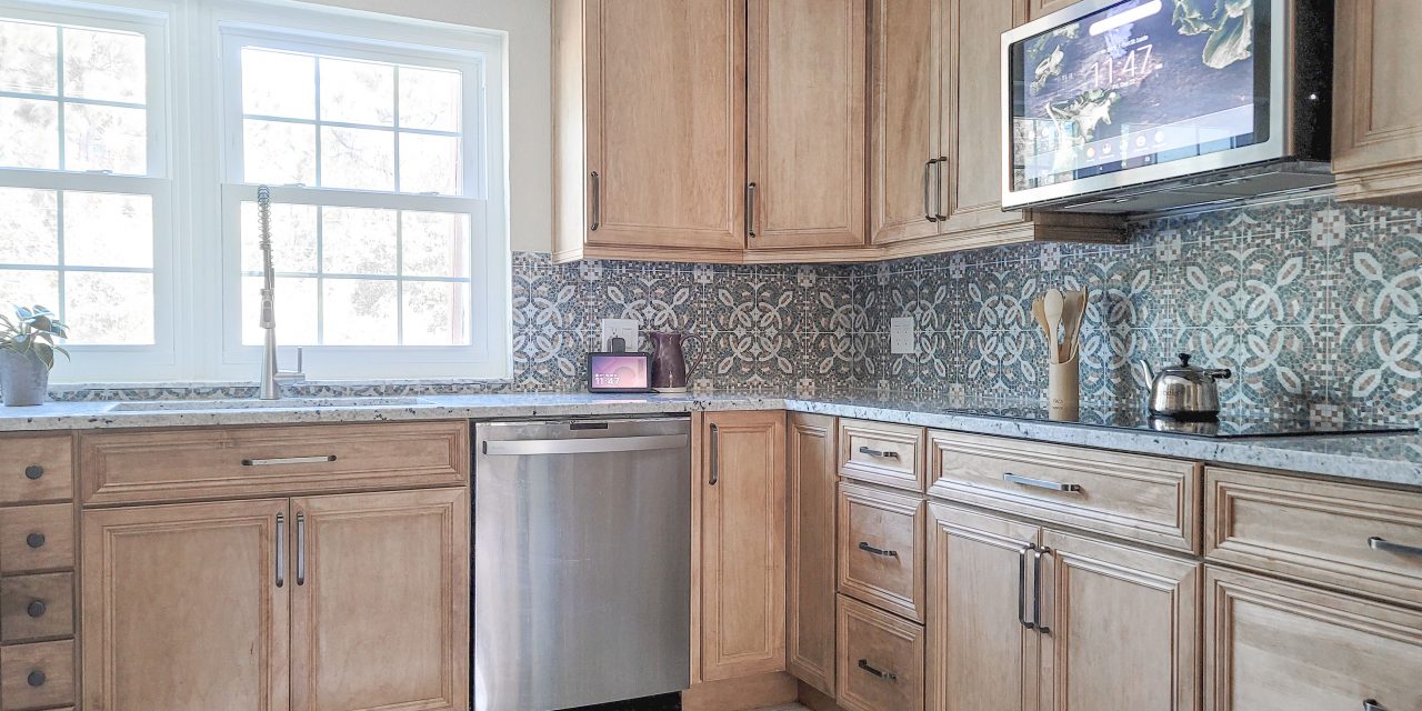 What defines a top cabinet design firm?