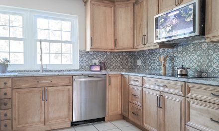 What defines a top cabinet design firm?